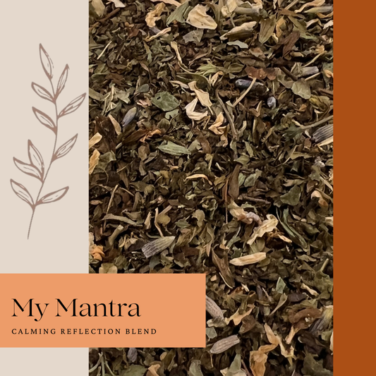 Tea leaves with 'My Mantra Calming Reflection Blend' label on an orange background